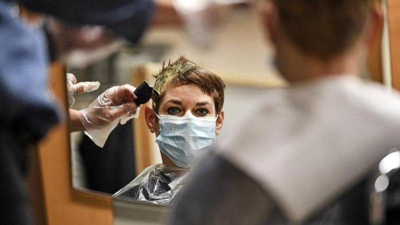 Locks down: German hairdressers reopen despite virus fears