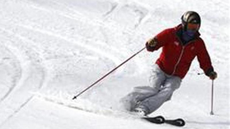 Skiers celebrate midsummer midnight in Sweden