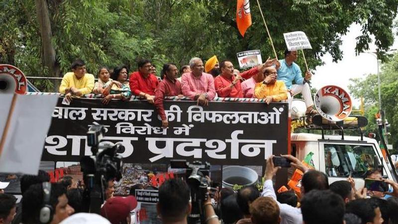 Delhi BJP Stages Protest Near AAP Office, Demands Resignation Of CM ...