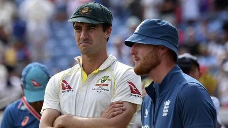 Pat Cummins with Ben Stokes