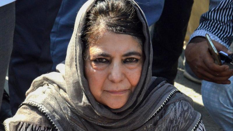 PDP chief Mehbooba Mufti sits on a protest after the alleged detention of her party workers, on the day of voting in the sixth phase of Lok Sabha elections, in Anantnag district