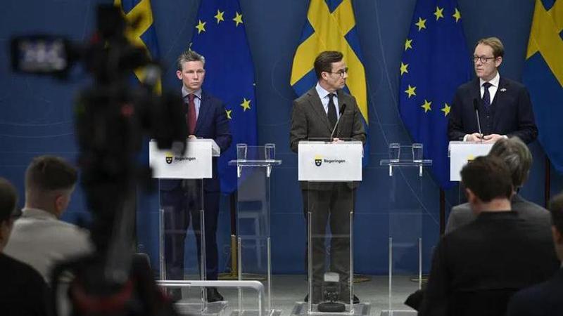 Sweden's Defense Minister Pal Jonson, Prime Minister Ulf Kristersson and Foreign Minister Tobias Billstrom