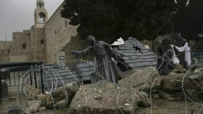  A nativity scene decorated to honor the victims in Gaza is displayed in Manger Square, near the Nativity Church, which is traditionally believed to be the birthplace of Jesus, on Christmas Eve, in the West Bank city of Bethlehem