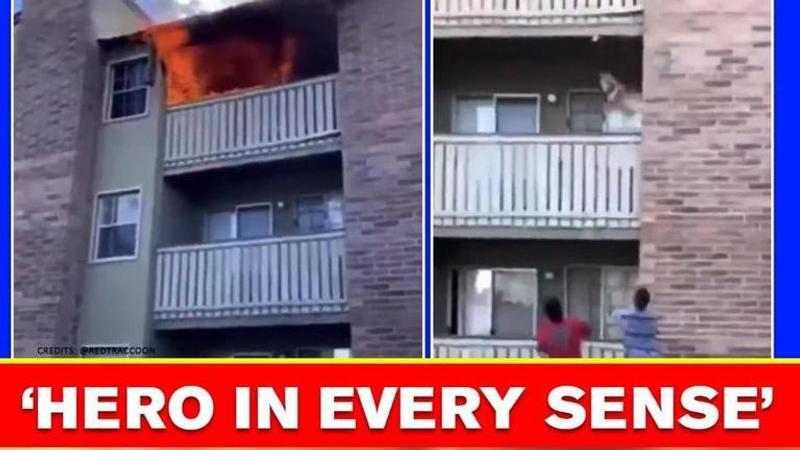 Toddler thrown from burning building caught by ex officer in US