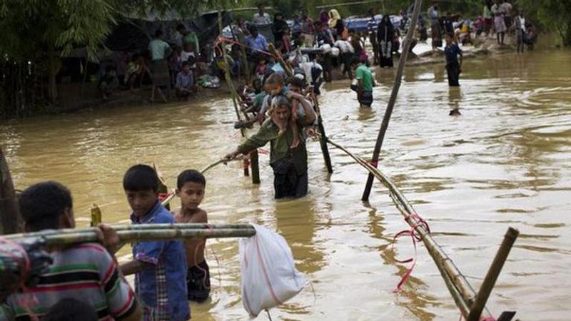 Malaysia searches for 24 Rohingya feared drowned off island