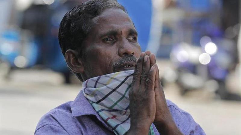 Sri Lankans remember Easter bomb victims at home amid virus