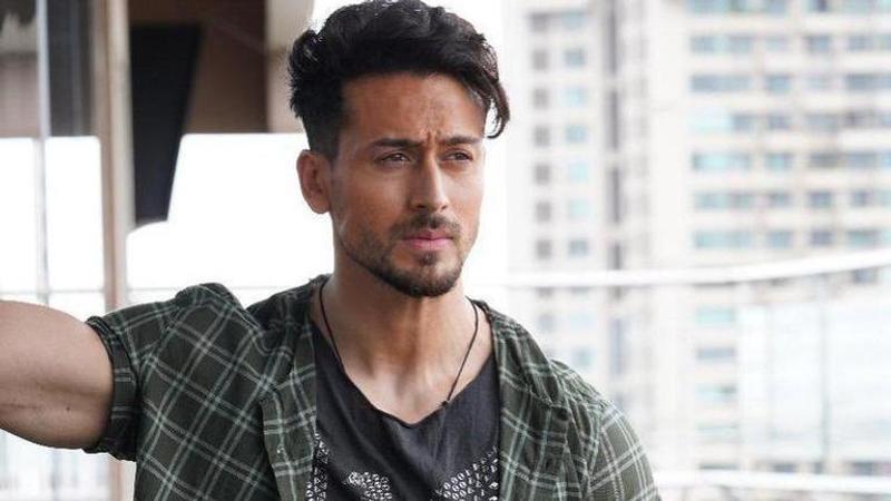 Tiger Shroff guides a young fan after he sustains injury while practicing former's stunt