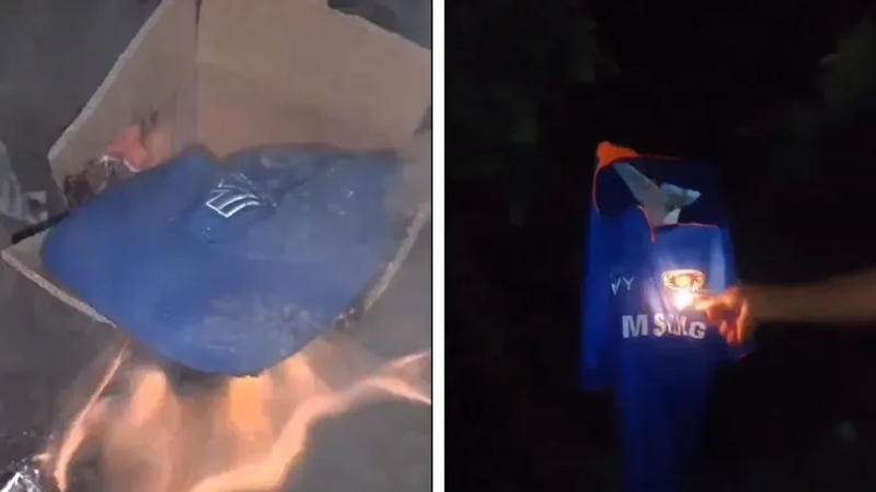 Angry MI fans burn team cap and jersey