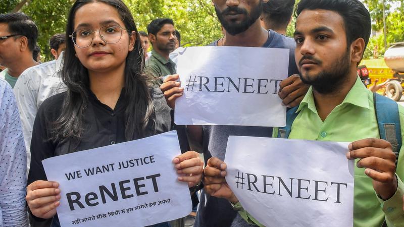 NSUI members stage a protest demanding re-examination of NEET-UG Entrance Exam 2024 over alleged irregularities in its results, at Jantar Mantar in New Delhi