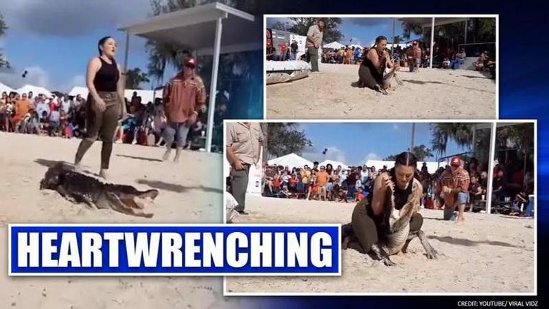 US woman puts head in alligator's mouth during wrestling match, video surfaces