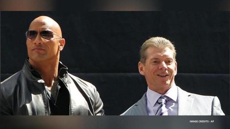 dwayne johnson buys xfl