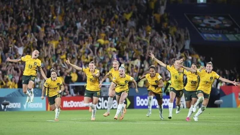 Australia players celebrate after winning the Women’s World Cup quarterfinal soccer match between Australia and France