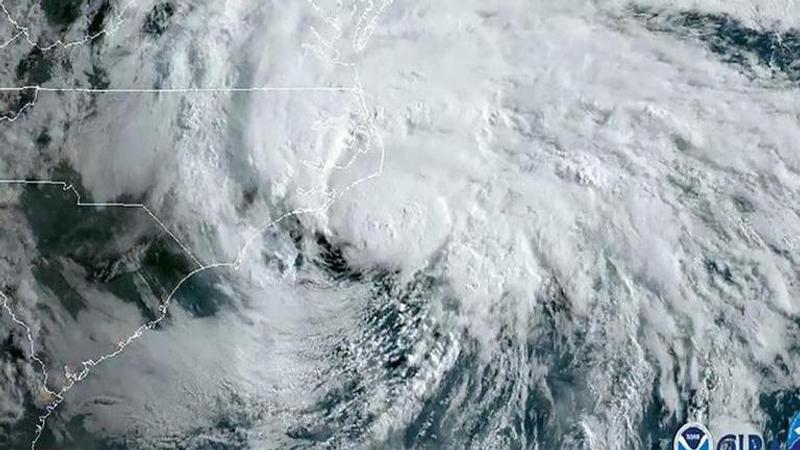 Tropical Storm Arthur spins out to sea, will drench Bermuda