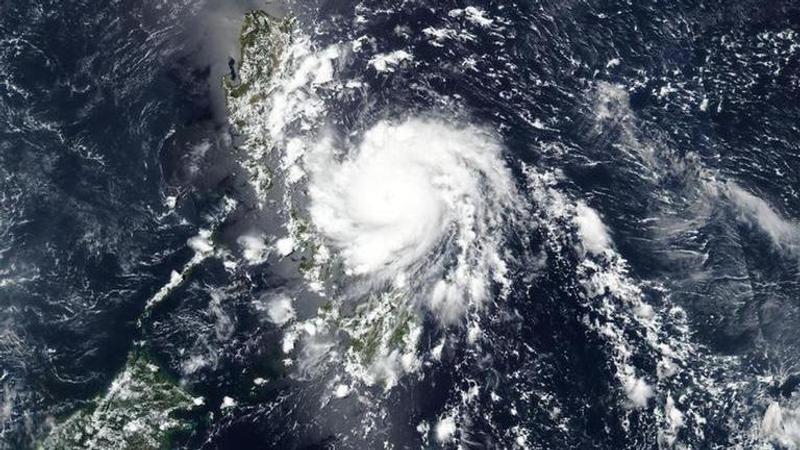 Philippines riding out typhoon after virus slows evacuations