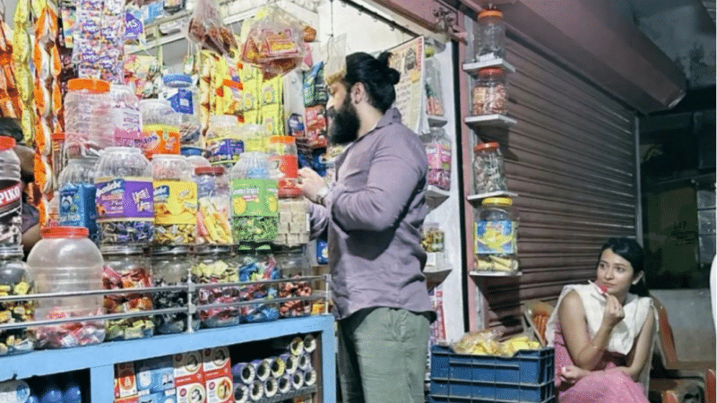 Yash at a candy shop with his wife