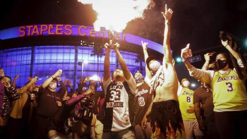 Fans, some rowdy, cheer Lakers win outside Staples Center