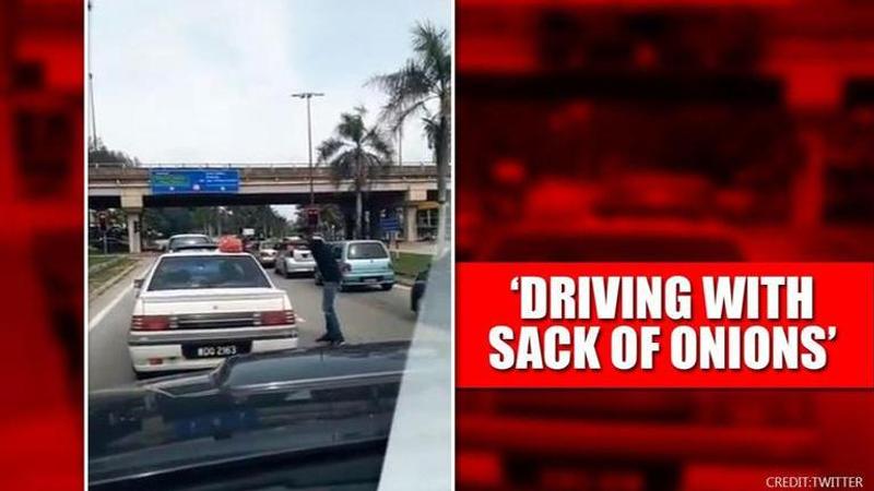 Video of man driving with sack of onions on his car roof has people in splits