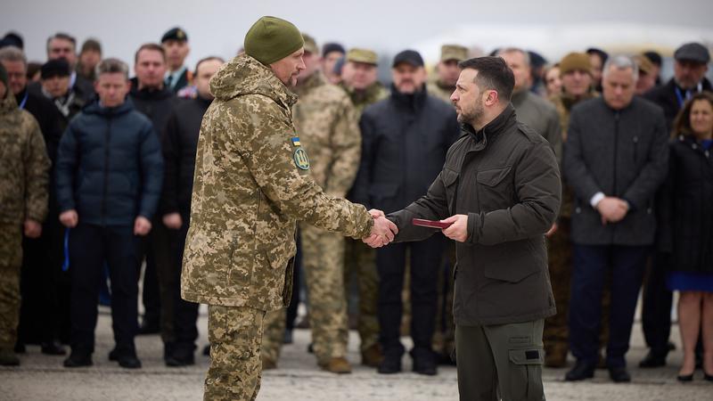 Ukrainian President Volodymyr Zelenskyy gives medal of honour to Ukrainian soldier