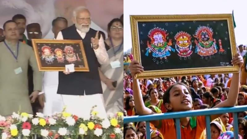 PM Modi Receives Lord Jagannath's Painting From Little Girl In West Bengal RallyPM Modi Receives Lord Jagannath's Painting From Little Girl In West Bengal Rally