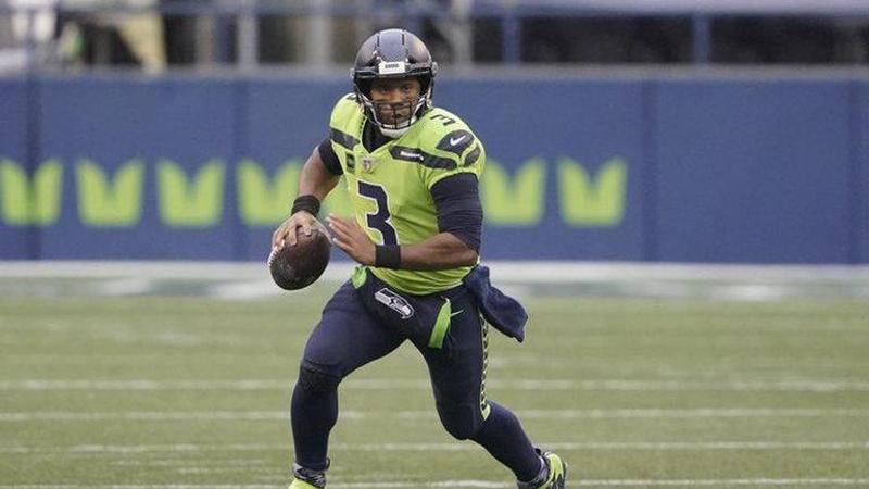 Russell Wilson stays busy on and off the NFL field