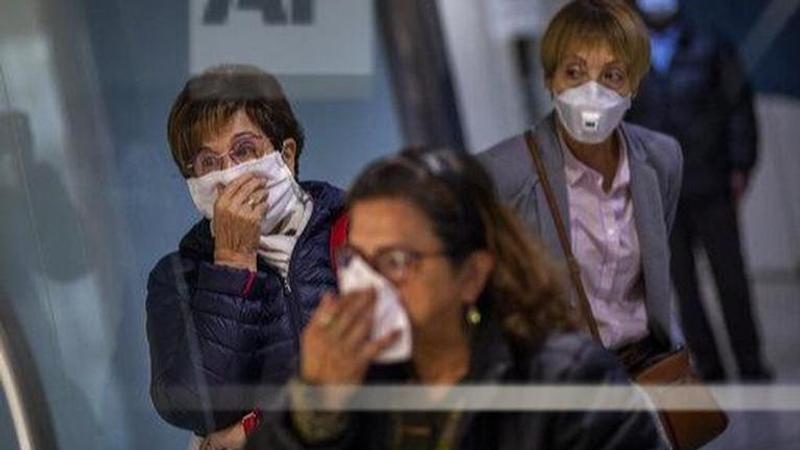 Spain virus cases top 13,700 with nearly 600 deaths