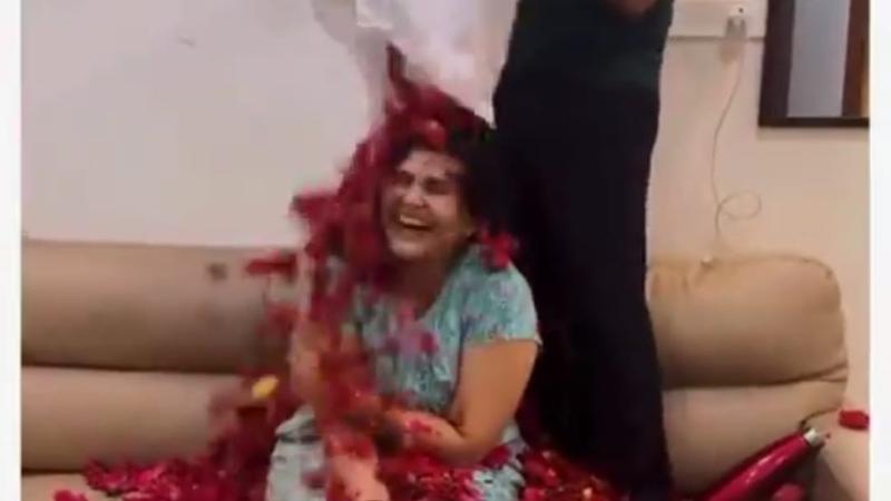 heartwarming video of a husband showering his wife with flowers to show how much he loves her goes viral 