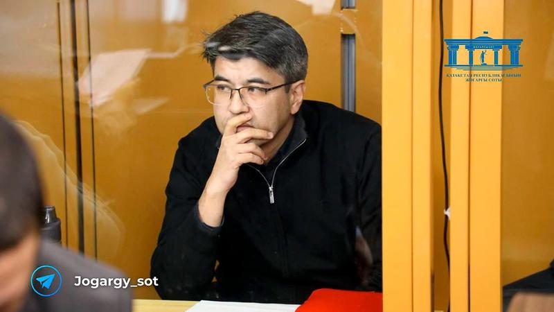 In this photo released by the Kazakhstan Supreme Court Press Office’s Telegram channel on Friday, April 12, 2024, businessman Kuandyk Bishimbayev, the country’s former economy minister, sits in a defendants’ cage at his trial in Astana, Kazakhstan.