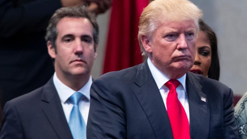 FILE- Donald Trump, right, and attorney Michael Cohen, left, during a visit to the Pastors Leadership Conference at New Spirit Revival Center, Sept. 21, 2016, in Cleveland.  