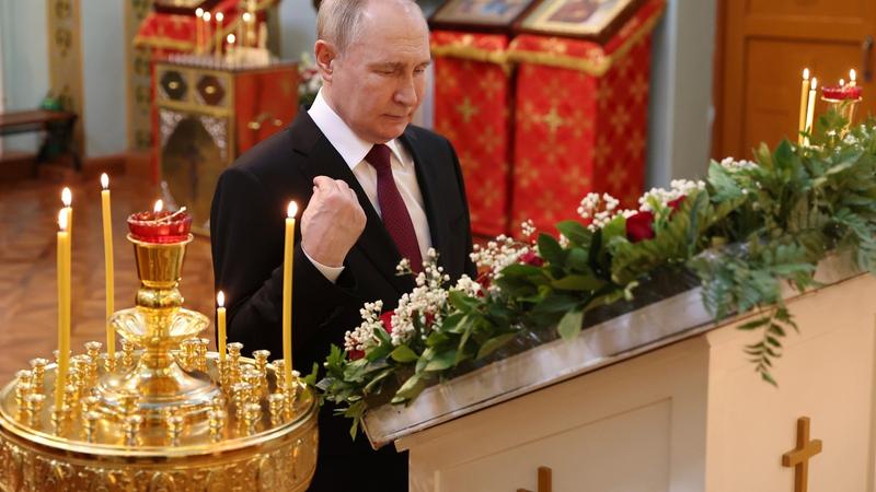 Vladimir Putin crosses himself as he visits the Church of the Intercession of the Mother of God in Harbin, northeastern China's Heilongjiang Province, May 17, 2024.