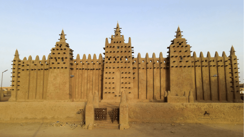 FILE- The world's largest mud-brick building, the Great Mosque of Djenne, Mali, awaits its annual replastering, May 10, 2024. 