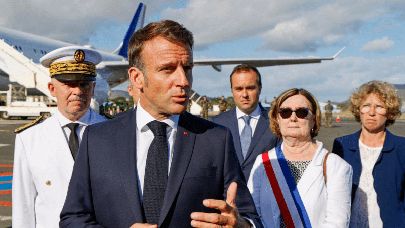 French President Emmanuel Macron gestures as he speaks with the press upon arrival at Noumea ñ La Tontouta International airport, in Noumea, New Caledonia, May 23, 2024. 