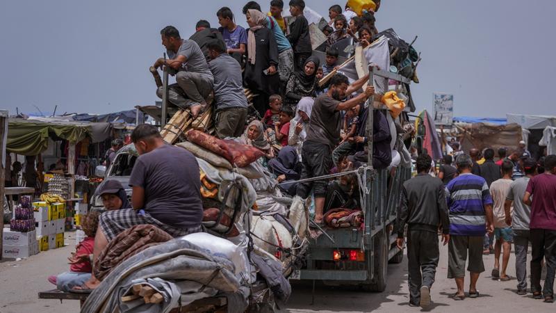 Palestinians fleeing from the southern Gaza city of Rafah during an Israeli ground and air offensive in the city on May 28, 2024. 