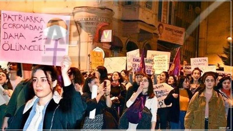 Turkish police dispense tear gas as crowd gathers to celebrate women's day