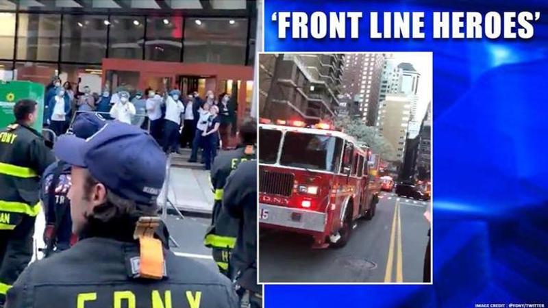 COVID-19: FDNY firefighters salute medical staff for their hard work | Watch