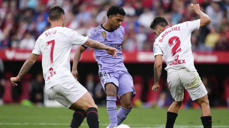 With Vinicius Junior out, Rodrygo scores 2 to lead Real Madrid to win at Sevilla