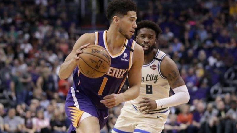 Booker, Rubio help Suns race past Giannis-less Bucks